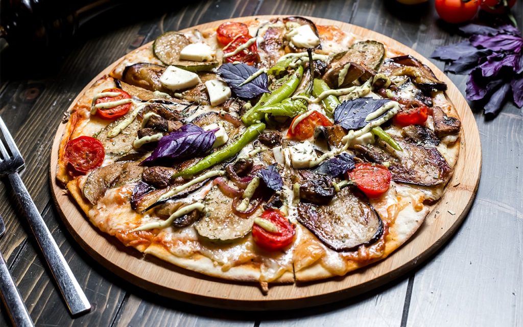 Healthy Pizza for fitness with broccoli and basil